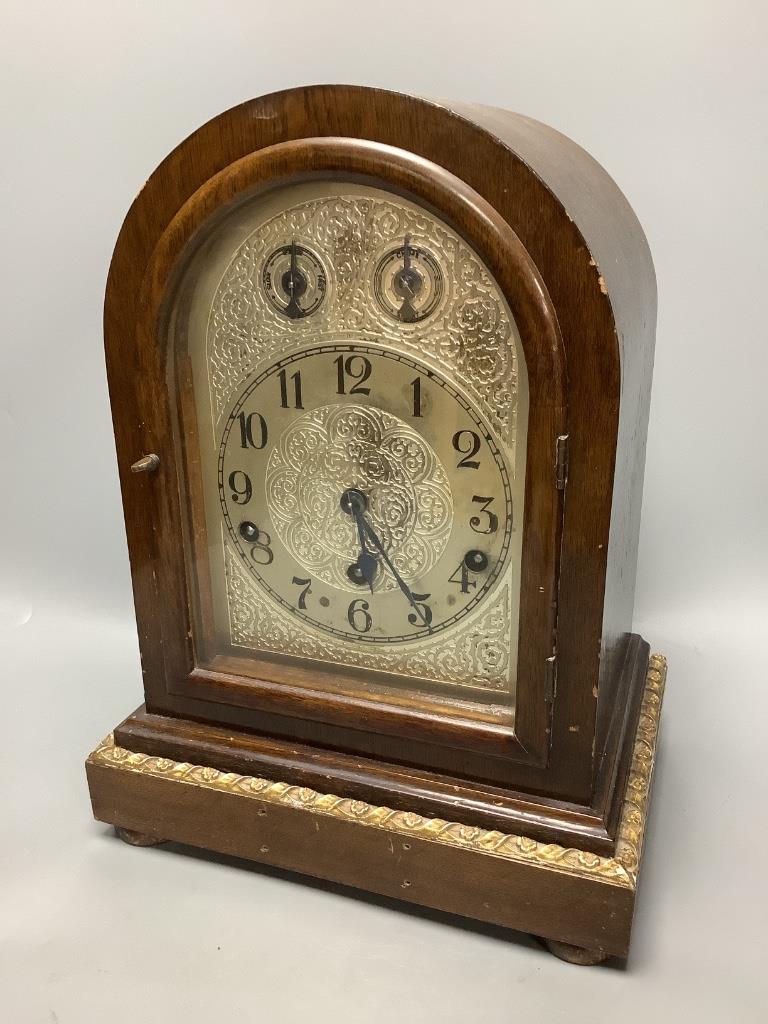 A German oak mantel clock